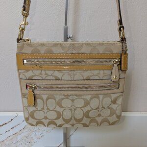 Coach crossbody, front zip pockets, jacquard & leather.